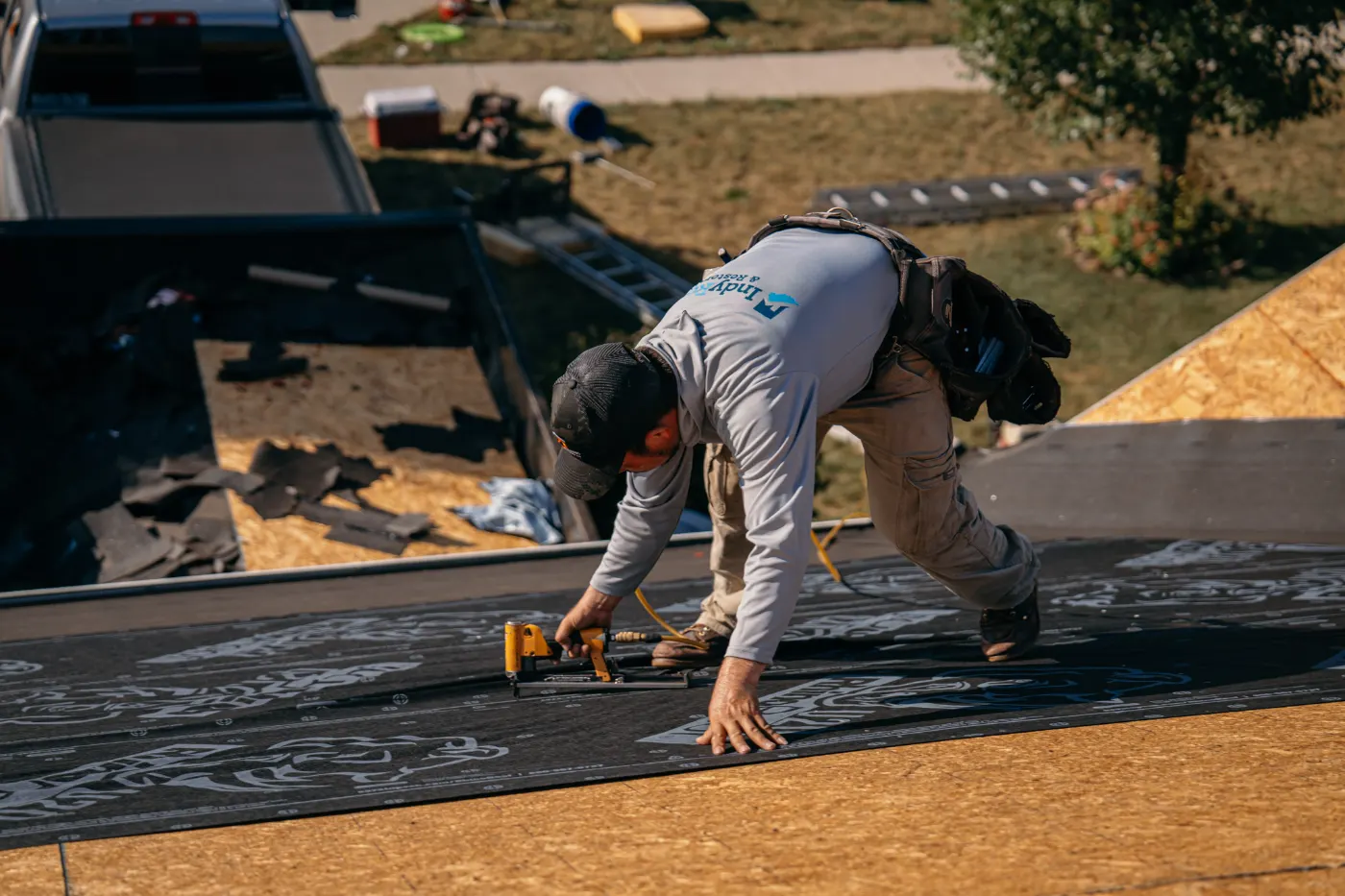 Tarping and dry-in on a Clay Corner commercial roof